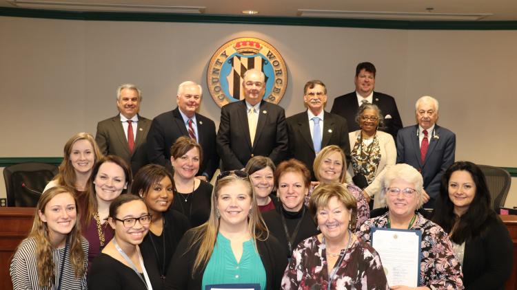 March 1, 2022, Worcester County Commissioners present a proclamation recognizing March as Professional Social Work Month to professionals representing the Department of Social Services (DSS), Worcester County Health Department, and Life Crisis