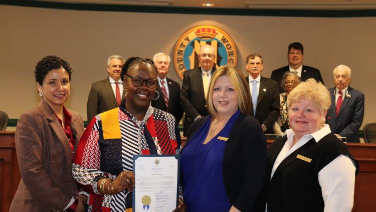 County Commissioners present a proclamation recognizing March as Women’s History Month to Commission for Women